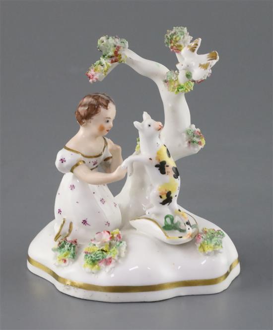 A rare Staffordshire porcelain group of a cat and a girl by a tree, possibly Dudson, c.1835-50, H. 11.5cm